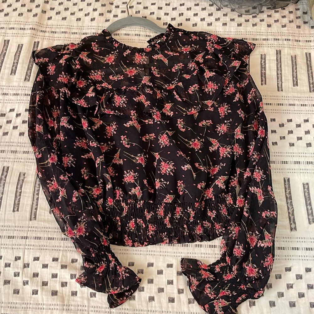 Black blouse with flower print